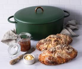 Plaited loaves with crumble topping baked in a cast iron pot