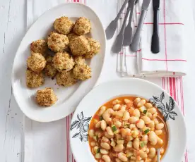 Cubos de peixe panados com salada quente de feijão e curgete