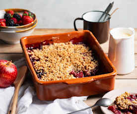 Fruit crumble with crème anglaise
