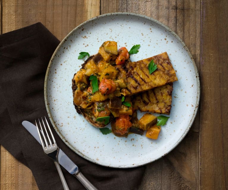 Eggplant and tomato breakfast hash with crispy tempeh