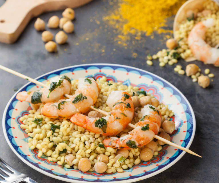 Orzo al curry, gamberi ed emulsione al basilico