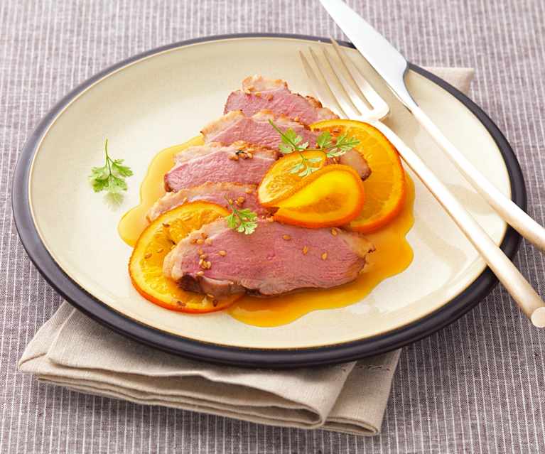 Magret de canard en papillote, sauce à l'orange Magret de canard en papillote, sauce à l'orange