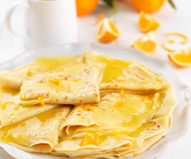 Crepes de farinha de milho com molho de laranja