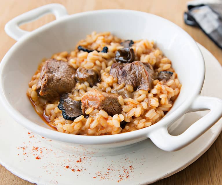 Arroz con setas de temporada, pato y trufa