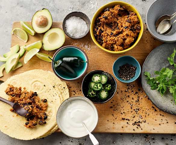 Tex-Mex tortilla's met varkensreepjes en zwarte bonen