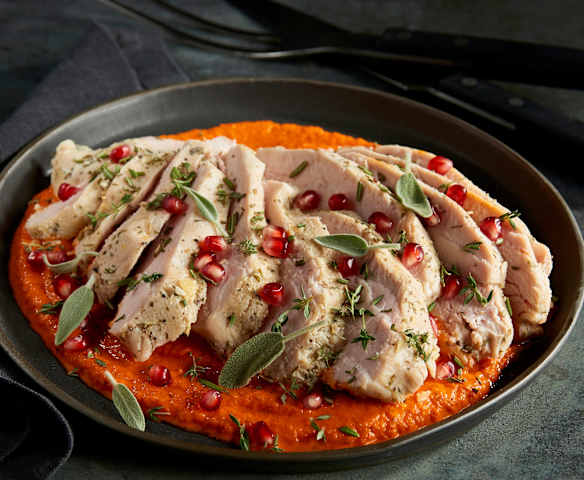 Sous-vide Herbed Turkey with Roasted Red Pepper Sauce