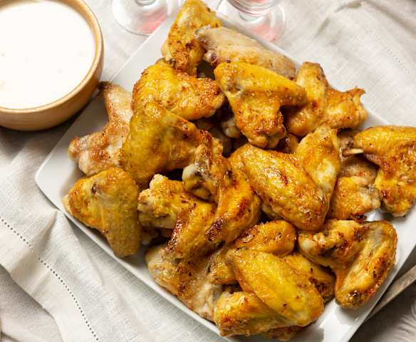 Alitas de pollo picantes con salsa Alfredo