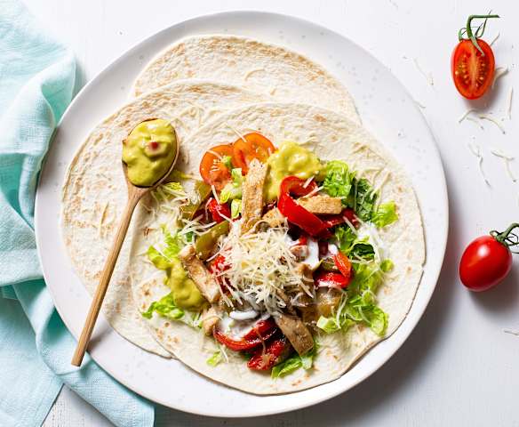 Fajitas de pez espada con pimientos