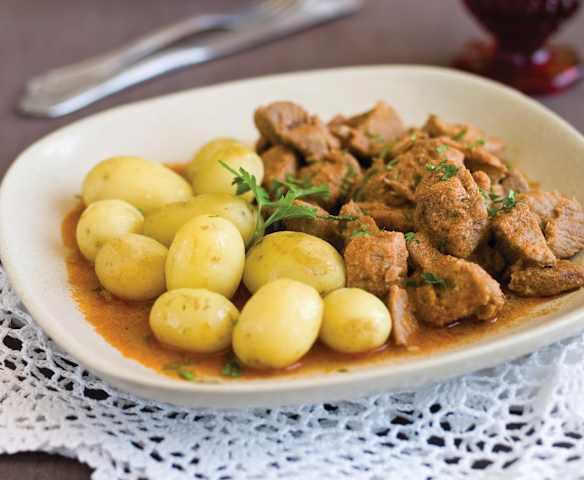 Carne de porco em vinha d’alhos