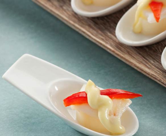 Bacalao confitado con pimientos rojos y emulsión de pilpil