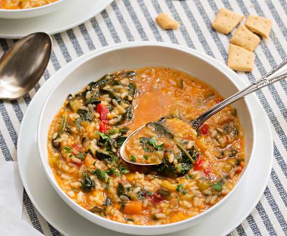 Arroz caldoso con verduras y espinacas Arroz caldoso con verduras y espinacas