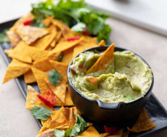 Soft Carrot Tortilla Chips with Guacamole