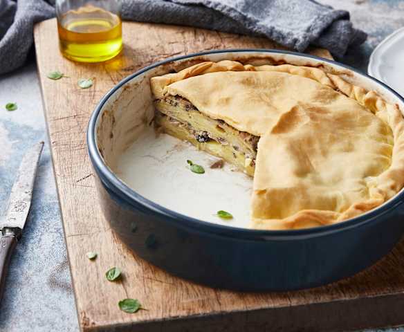 Tourte pommes de terre, poireaux, champignons et lardons