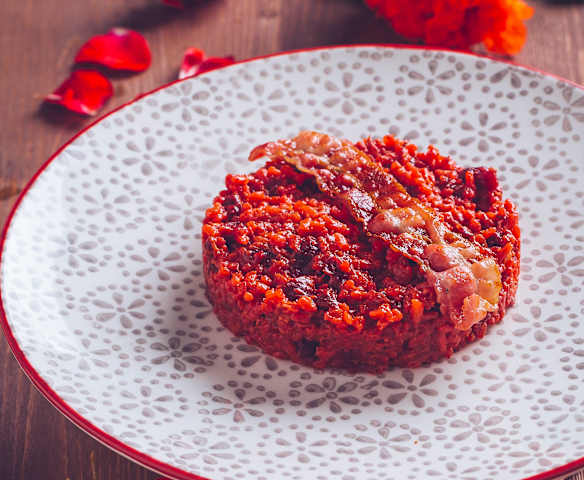 Risotto alla barbabietola e bacon croccante Risotto alla barbabietola e bacon croccante