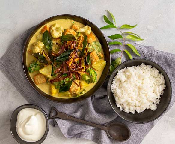 Sweet potato korma with crispy potato skins