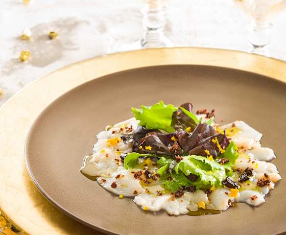 Carpaccio de vieiras con aceite a la vainilla