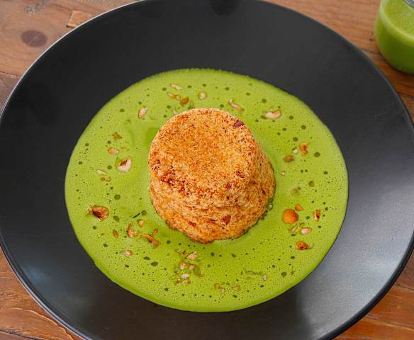 Double-baked cheese soufflés with asparagus sauce