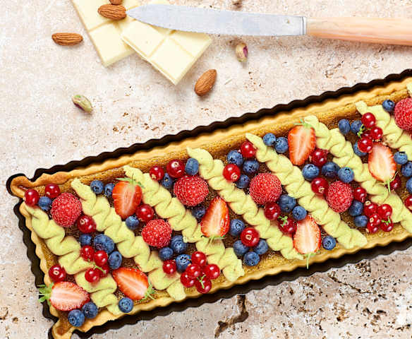 Délice d'été aux fruits rouges et à la pistache