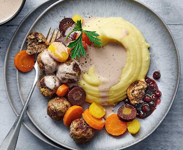 Fleischbällchen mit Kartoffelstock Fleischbällchen mit Kartoffelstock