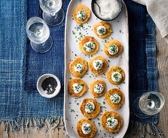 Sweet potato blini with cumin & sesame crème fraîche