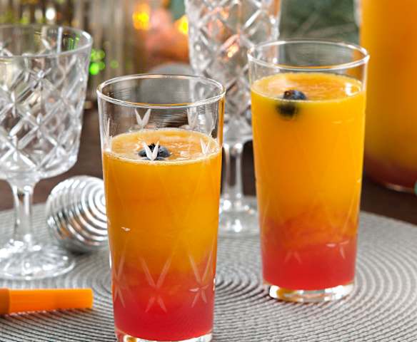 Mocktail de melocotón y arándanos rojos