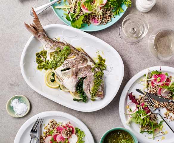 Steamed whole fish with quinoa salad and salsa verde