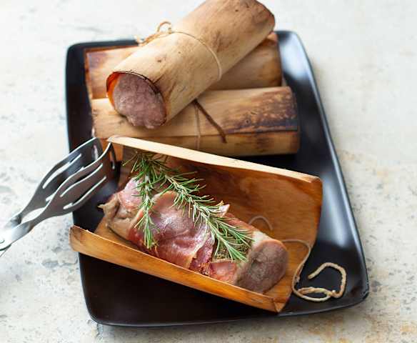 Cedar-wrapped pork with rosemary