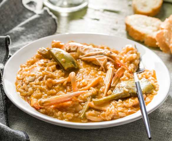 Arroz meloso con alcachofas y cigalas