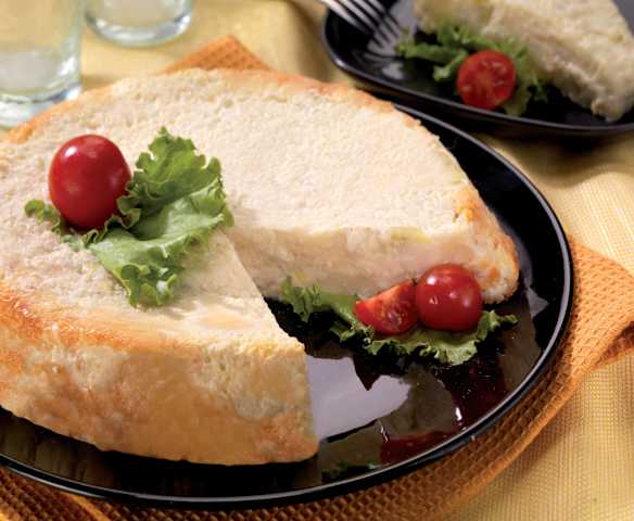 Sformato di pane con porri e crema al Parmigiano reggiano filante