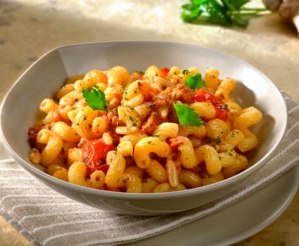 Cavatappi con pomodorini, uvetta e zenzero