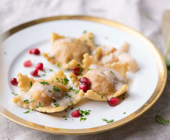 Raviolis de nueces con salsa de cava