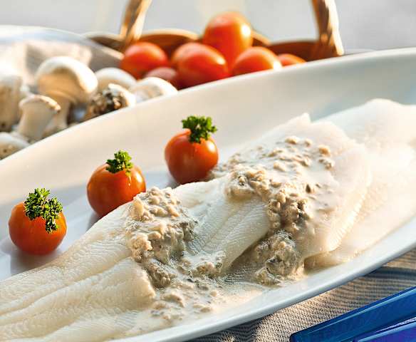 Pescado con salsa de champiñones