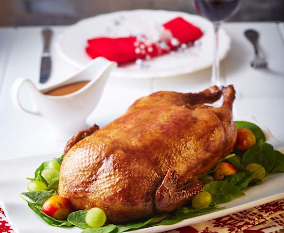 Pato navideño en salsa de ponche