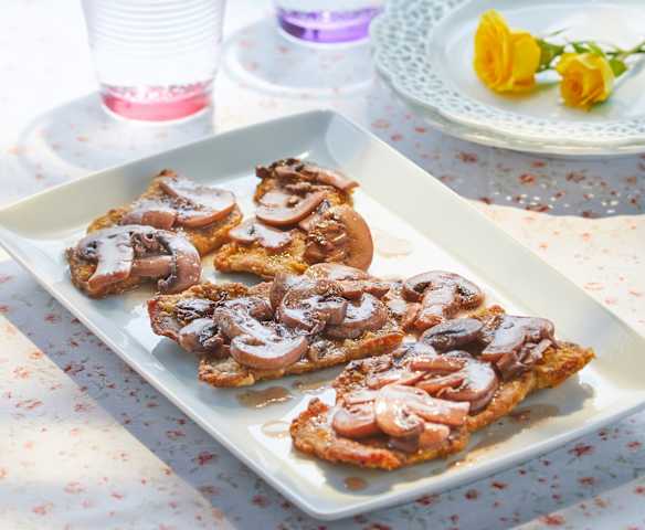 Escalopines al marsala con champiñones