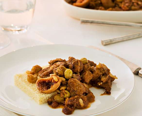 Cordero guisado con uvas blancas