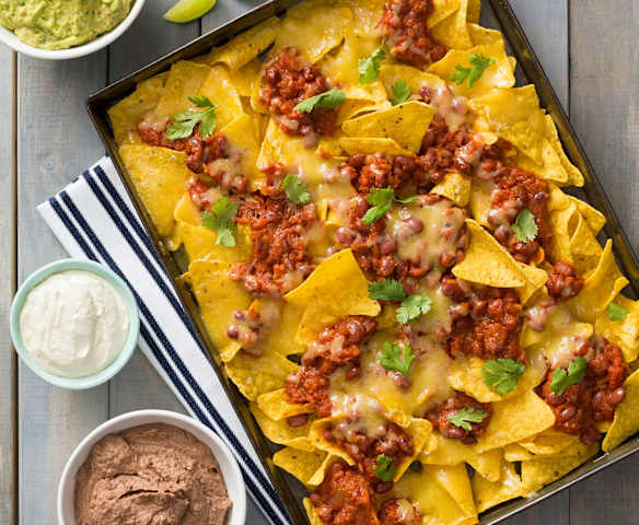 Nachos with beans and cashew sour cream