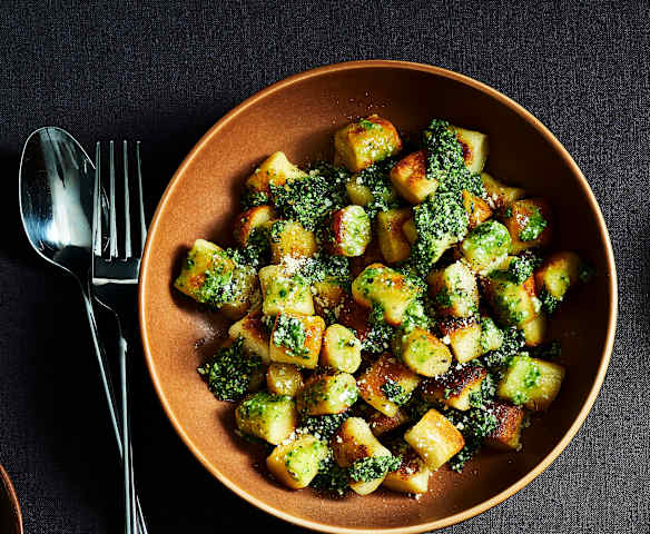 Ricotta gnocchi with walnut and spinach pesto