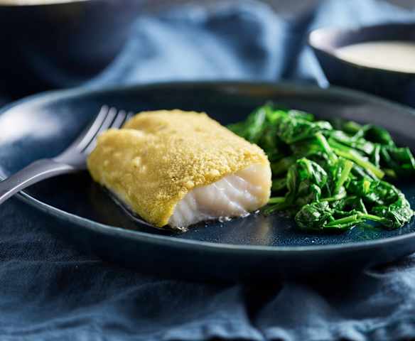 Merluzzo in crosta di erbe con riso e salsa al limone