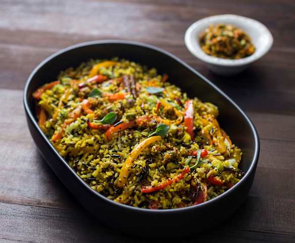 Carrot, capsicum and pistachio pilaf