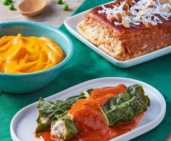 Rollos de acelga con carne, puré de camote y budin de pan