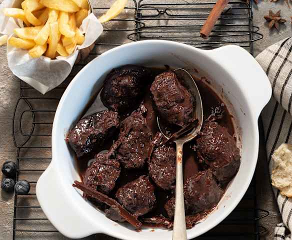 Carrilleras estofadas con salsa de arándanos