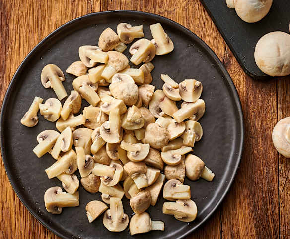 Champiñones en cuartos al vapor (400-500 g) en Varoma