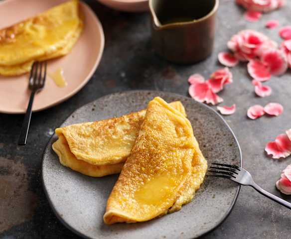 Crepes com molho de laranja