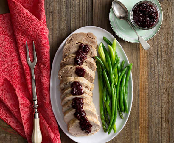 Turkey roll with cranberry and cherry sauce