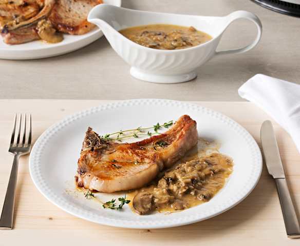 Chuletas de cerdo con salsa de champiñones al Marsala