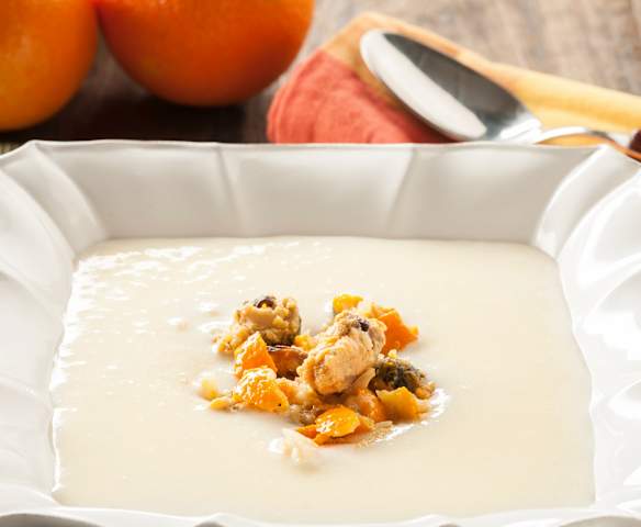 Crema parmentier al ajo con mejillones a la naranja