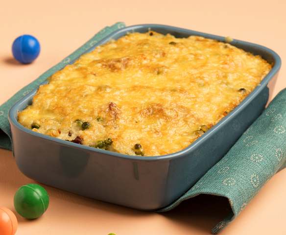 Überbackenes Risibisi mit Schweinefleisch