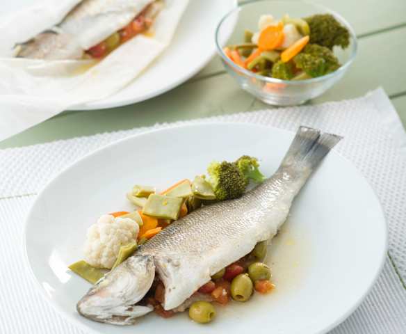 Lubinas de ración en papillote para dos