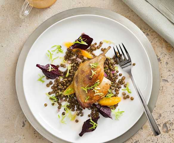 Duck confit with lentil & orange salad
