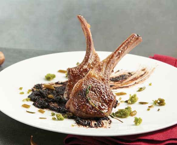 Lamb with Black Garlic Romesco and Pickled Chives (Wylie Dufresne)